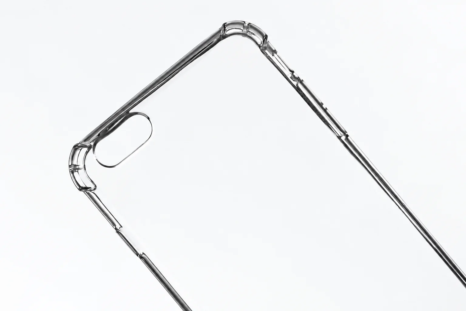 Close-up of the rim and camera opening of a transparent phone case.